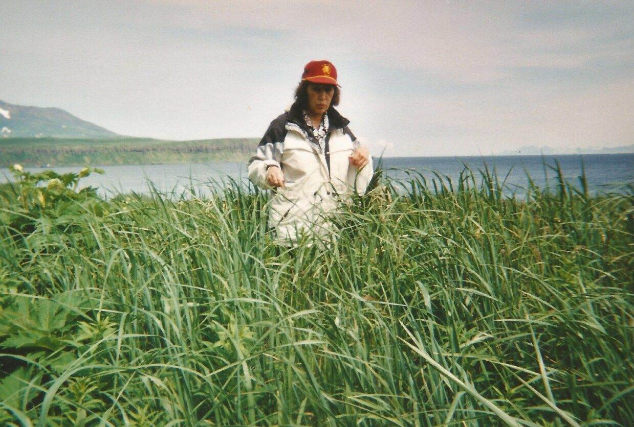 Agnes Thompson Gathering Grass
