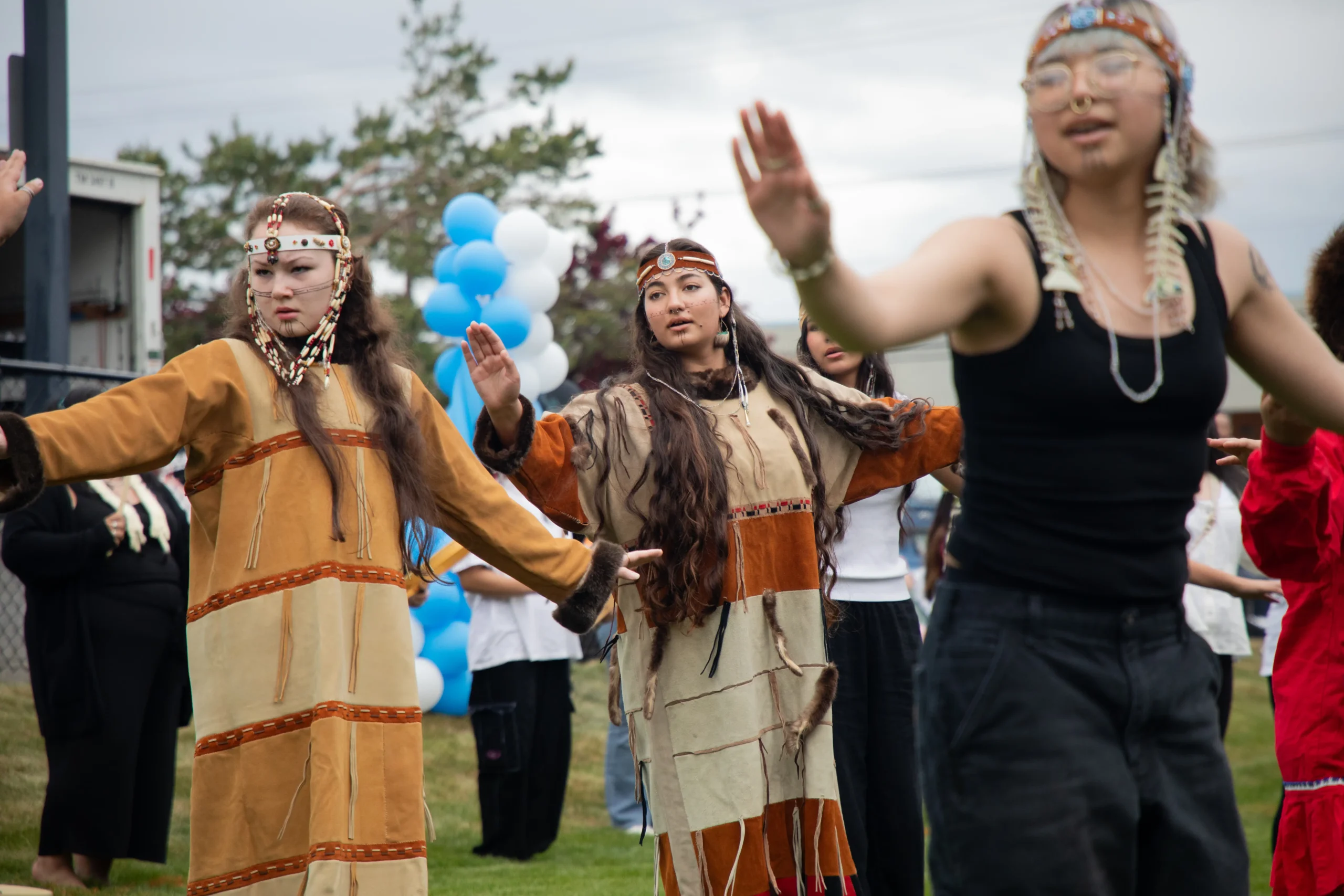 Culture Camp dancers, some dressed in cultural regalia