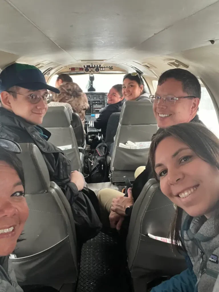 Aleut Team on their way to Sand Point in a plane